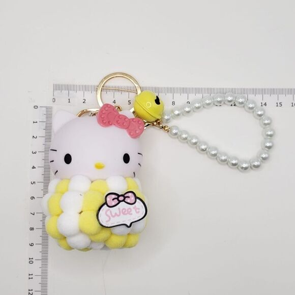 Brand New Hello Kitty Yellow Pearl Keychain - Picture 3 of 3